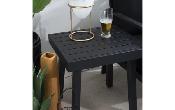Suvi Black Aluminum Outdoor Side Table from Suvi Outdoor collection, transitional style with rust-resistant black powder-coated aluminum and steel, sturdy slatted top for drinks and decor, lightweight under 10 lbs, supports up to 100 lbs, ideal for patios.