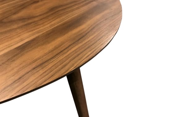 Mid-century modern Maderna Brown Coffee Table with curved walnut veneer top and angled legs, showcasing industrial style and durable wood finish.