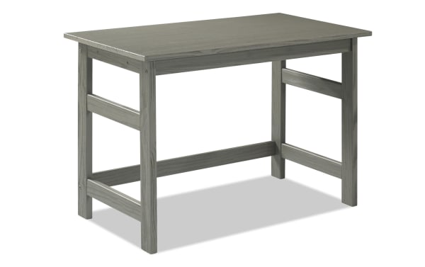 Henry Gray Solid Wood Desk from the Henry collection, featuring transitional style, gray pine solids, and sturdy slatted leg supports for a durable workspace.