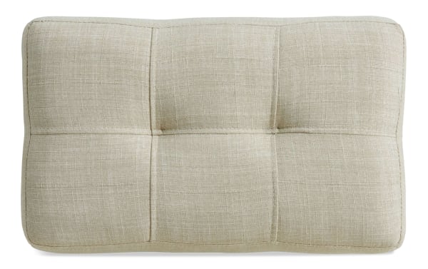 Beige rectangular upholstered sofa table stool cushion with fabric texture and tufted stitching, part of Patton transitional furniture set.