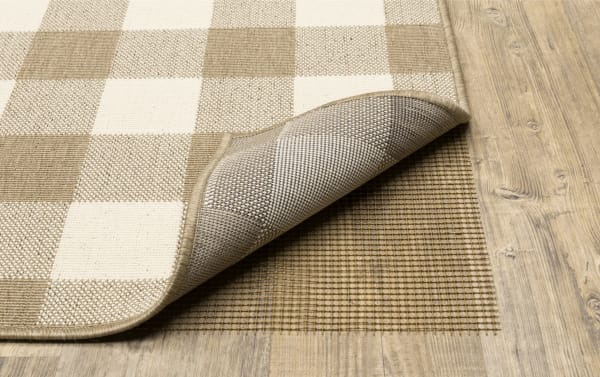 Brown outdoor rug pad by Bob's, 9' x 12', transitional style with polyester fabric, slip-resistant backing for weather-resistant use on wood or tile floors.
