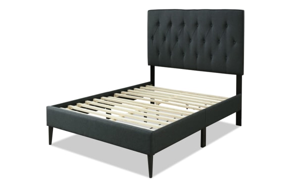 Aimee Twin Charcoal Upholstered Platform Bed with gray polyester fabric, button tufted headboard, wood slats, and transitional style frame.
