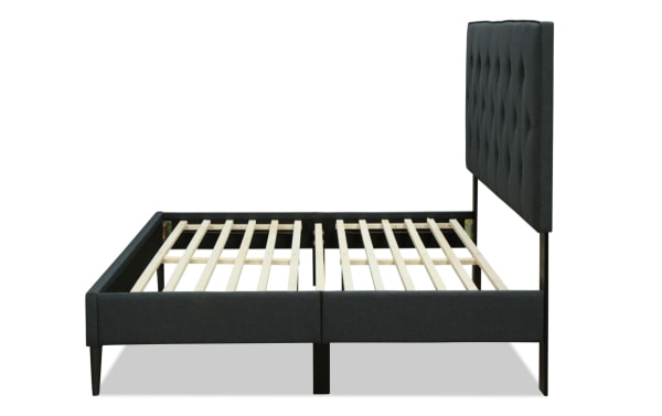 Aimee Twin Charcoal Upholstered Platform Bed with gray polyester fabric, button tufted headboard, wooden slats, and transitional style frame.