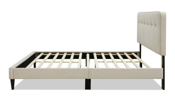 Lila King beige upholstered platform bed with wood frame, beige polyester fabric, button tufted headboard, and transitional style.