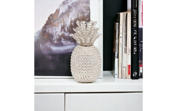 15'' Silver glam pineapple sculpture made of crystal with a textured, light-catching surface, ideal for stylish home decor accents.