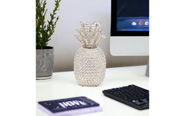 15'' Silver Glam Pineapple Sculpture made of crystal with a light-catching faceted design, perfect for glam home decor accents.
