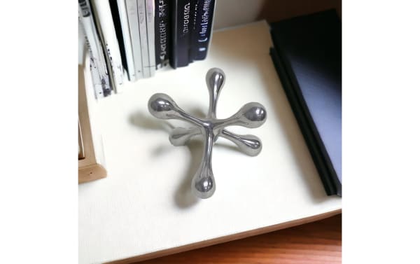 5'' Ozi Silver Decorative Jack made of polished metal in a transitional style, featuring smooth, rounded ends for versatile home décor.