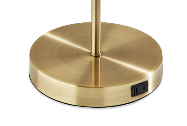 Contemporary Juni White & Antique Brass Table Lamp base with brushed metal finish and built-in black AC outlet switch for charging.