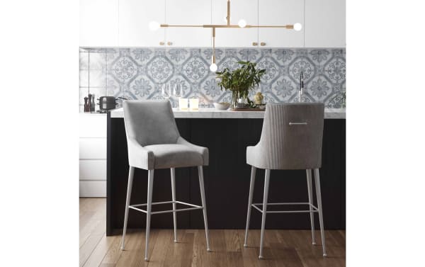 Giselle Light Gray Solid Back Bar Height Stool with soft velvet upholstery, stainless steel legs, and a matching back handle in contemporary style.