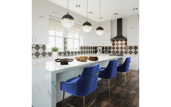 Contemporary Giselle Navy Solid Back Counter Height Stool with plush blue velvet upholstery, stainless steel legs, and a matching back handle.