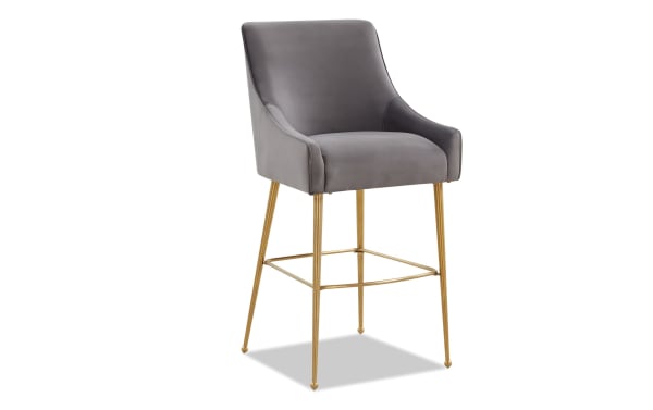 Contemporary Giselle counter height stool with dark gray velvet upholstery, stainless steel gold legs, and a solid back for stylish seating.