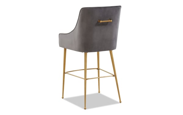 Giselle dark gray velvet counter height stool with solid back, gold stainless steel legs, and matching back handle in contemporary style.