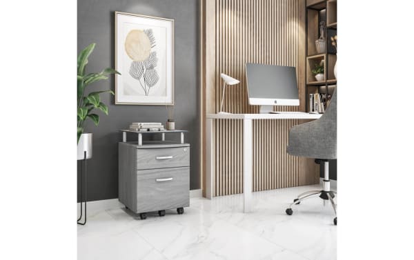 Adrian Gray 2 Drawer File Cabinet in contemporary style with tempered glass top and MDF body, featuring dual-locking gray wood drawers on casters for office organization.