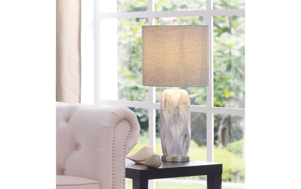 Contemporary Ariella White Table Lamp with gray ceramic base featuring artistic veining and a solid fabric shade, ideal for stylish living rooms.