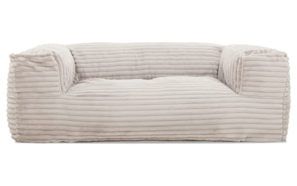 Sofia 71'' Cream Taupe Beanbag Sofa with plush polyester fabric upholstery, foam filling, and transitional style for versatile, cozy seating.