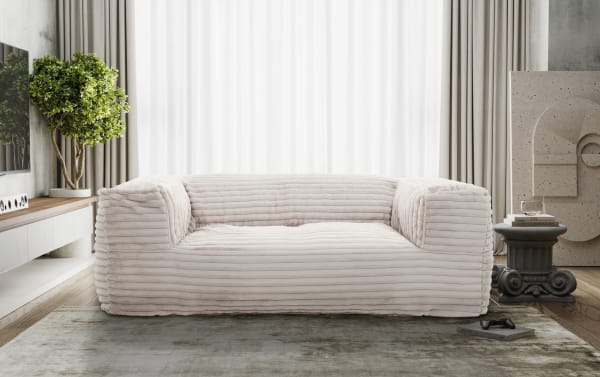 Sofia 71'' Cream Beanbag Sofa in taupe polyester fabric with plush foam filling, featuring a minimalist transitional style and soft, ribbed upholstery.