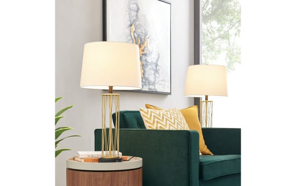 Contemporary Dallas Gold Table Lamp set of 2 with white fabric shades, gold metal bases, and built-in USB ports for charging devices.