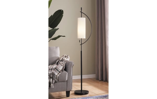 Gabriel 63.5'' black metal floor lamp with contemporary curved base design and sleek cylindrical white shade, ideal for modern living spaces.