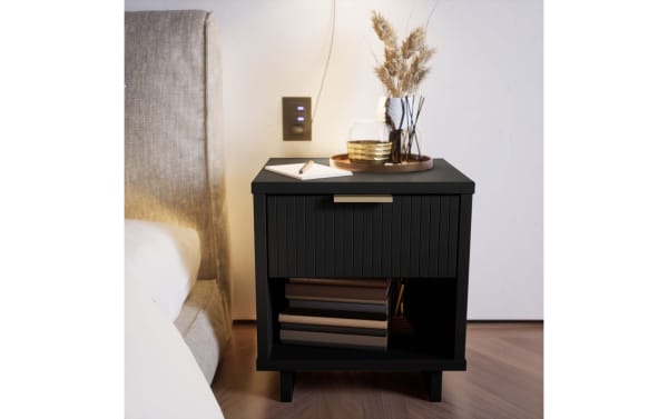 Contemporary Ascias Black Nightstand with Drawer, solid wood with vertical ribbed front, soft-close full extension drawer, open shelf, metal handle, UV paint finish.