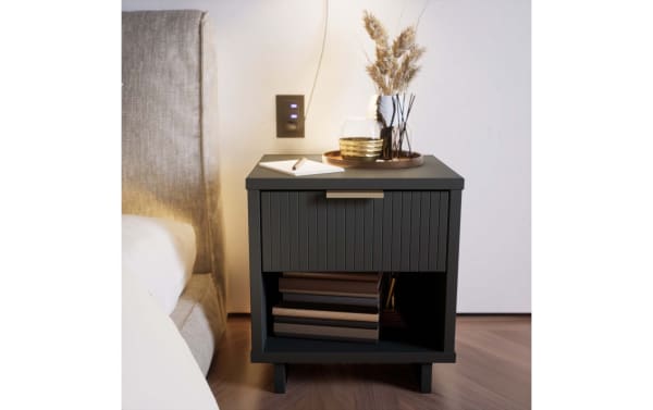 Ascias Charcoal Nightstand with Drawer in solid wood, contemporary style, vertical ribbed front, soft-close drawer, open shelf, metal handle, UV paint finish.