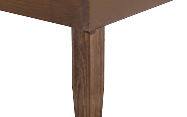 Corner detail of the Phoebe Queen Walnut Solid Wood Platform Bed showcasing the rich walnut finish, solid pine wood leg, and contemporary clean lines.