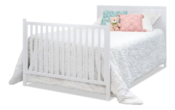Ollie White Full Size Bed Conversion Rails in transitional style, made of white pine solids and laminated veneer lumber, designed to convert Ollie 4-in-1 crib into a full bed with vertical slats and sturdy wood frame.