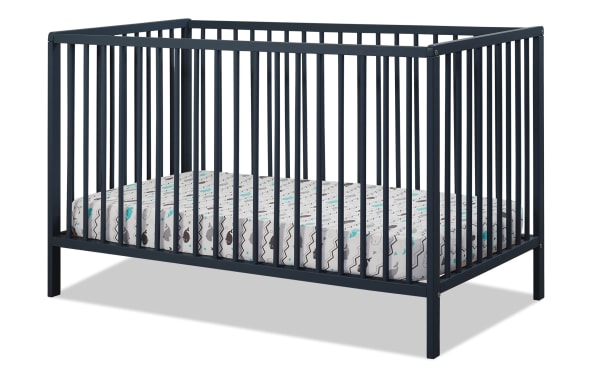 Primrose Navy 3-in-1 Convertible Crib in navy blue, made from 100% beech wood and plywood, featuring contemporary wooden slat design and toddler bed conversion.