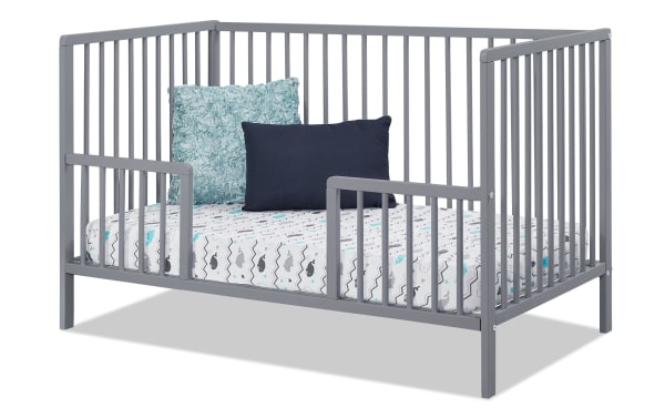 Primrose Gray 3-in-1 Convertible Crib in contemporary style, made of 100% beech wood and plywood, featuring gray wooden slats and toddler bed conversion rail.