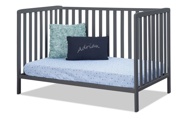 Avery Navy 3-in-1 Convertible Crib in contemporary Primrose Avery collection, made of solid beech wood and plywood, navy finish, with slatted sides, contoured corners, and adjustable mattress heights.