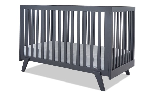 Serenity Navy 2-in-1 Convertible Crib in contemporary mid-century style, made of navy beech wood with flat slats and angled legs, converts to toddler bed.