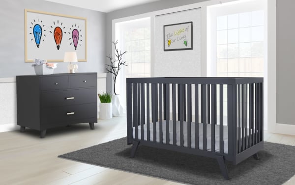 Serenity Navy 2-in-1 Convertible Crib in contemporary mid-century style, crafted from navy beech wood with flat slats and angled legs, convertible to toddler bed.