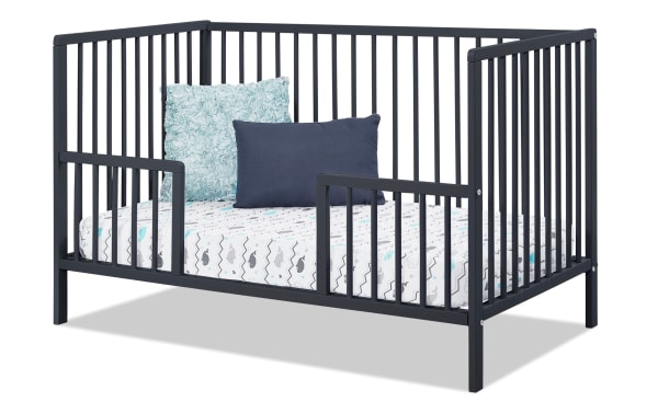 Avery/Primrose Navy Toddler Conversion Rail in transitional style, made of navy wood, designed to convert Avery or Primrose cribs into toddler beds with safety rails.