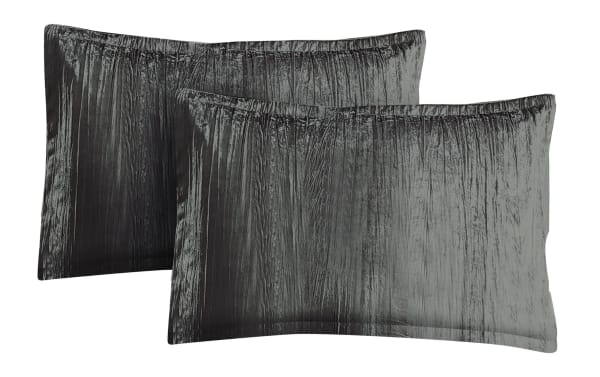 Zoey Queen Charcoal Solid Velvet pillow shams in metallic crinkle polyester fabric, adding a glam gray accent to bedroom decor.