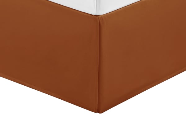 Corner view of the Zoey Queen Orange Solid Velvet 7 Piece Comforter Set featuring a rich orange metallic crinkle velvet fabric in glam style with smooth polyester upholstery.