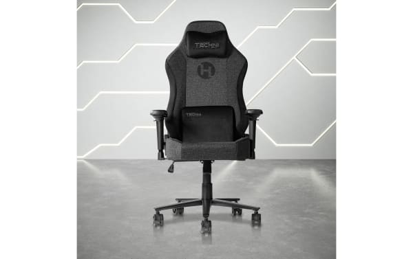 Lumen Black Gaming Chair by Techni, featuring black fabric and velvet upholstery, ergonomic design with memory foam padding, adjustable arms, 135-degree recline, and reinforced steel base for durable, comfortable gaming.