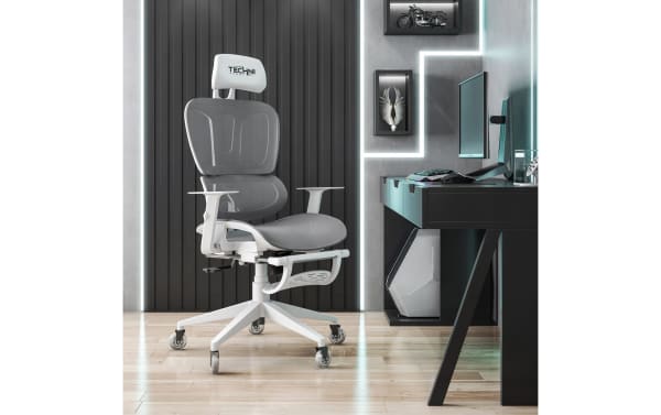 Daxton Gray Gaming Chair in gray mesh with nylon and steel frame, featuring adjustable armrests, reclining back, footrest, and breathable ergonomic design.