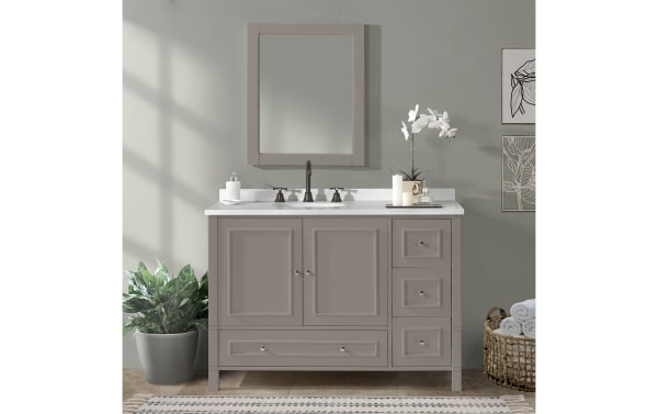 Randolph 48'' gray transitional bathroom vanity base in solid pine with shaker doors, nickel hardware, soft-close hinges, and spacious bottom drawer.
