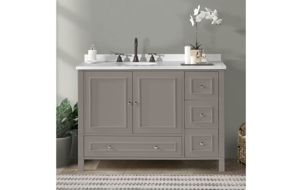 Randolph 48" gray transitional bathroom vanity base in solid pine with shaker doors, nickel hardware, soft-close hinges, and a spacious bottom drawer.