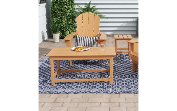 Paloma Light Brown Outdoor Adirondack Coffee Table in contemporary style, made from durable eco-friendly high-density plastic, ideal for patio sets.