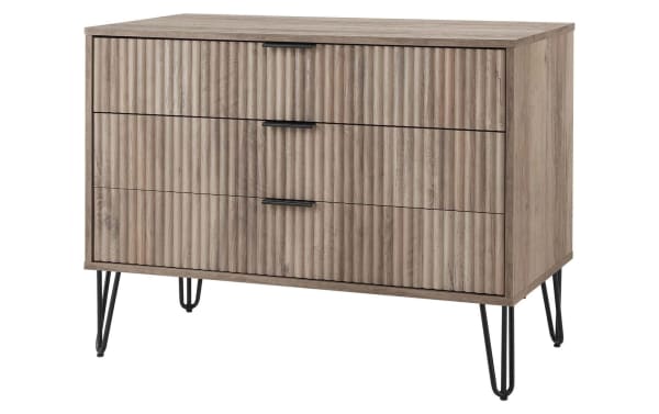 Delilah Weathered Gray 3 Drawer Dresser with vertical ribbed MDF fronts, black metal hairpin legs, contemporary style, soft-close drawers.