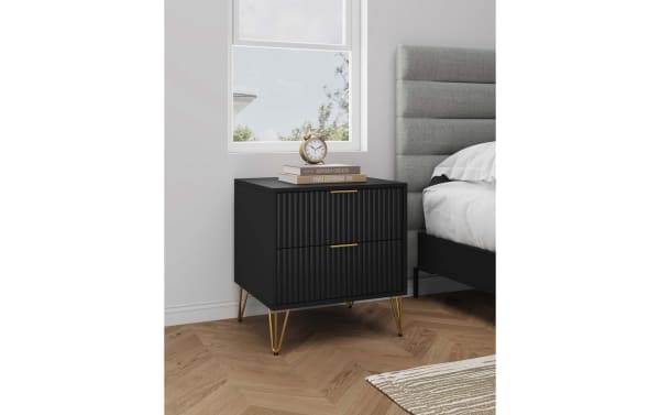 Delilah Black 2 Drawer Nightstand with vertical ribbed MDF fronts, gold metal splayed legs, and soft-close drawers in contemporary style.