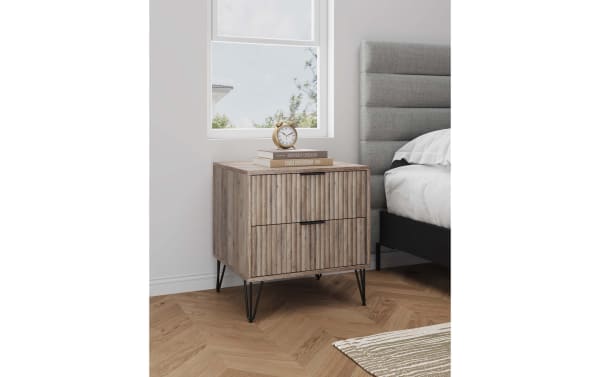 Delilah Weathered Gray 2 Drawer Nightstand with vertical ribbed MDF fronts, splayed black metal legs, and soft-close drawers in contemporary style.