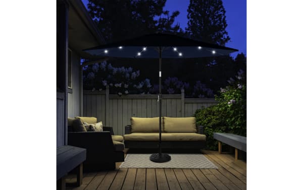 Maeve 10' navy blue outdoor market umbrella with 32 LED lights, polyester fabric canopy, steel pole, push-button tilt, and crank handle.
