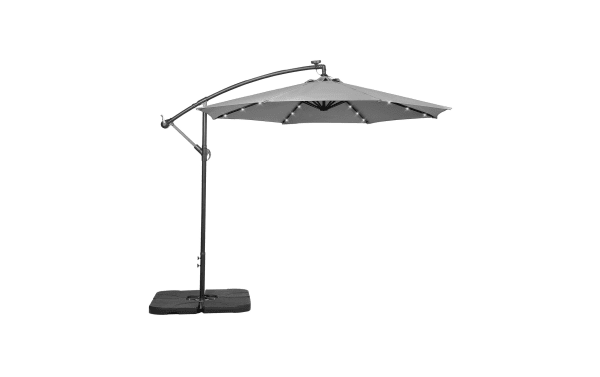 Outdoor cantilever patio umbrella with LED lights, gray fabric canopy, adjustable metal frame, and weighted base for stability.