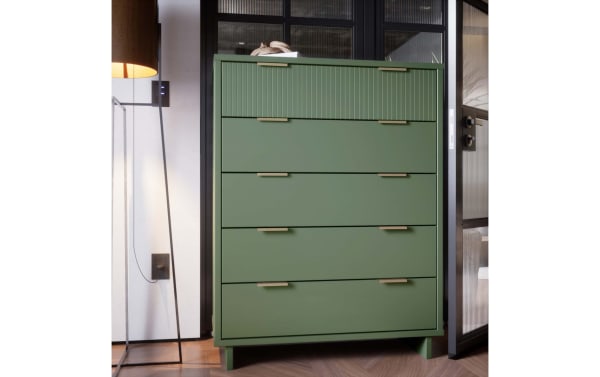Contemporary Ascias Green 5 Drawer Chest in solid wood with vertical-ribbed top drawer, soft-close full-extension drawers, mop base legs, and horizontal metal handles.