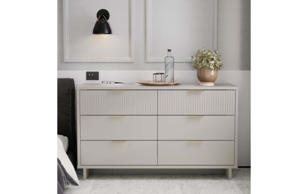 Contemporary Ascias Light Gray 6 Drawer Dresser in solid wood with vertical-ribbed drawer fronts, full-extension soft-close drawers, mop base legs, and sleek horizontal metal handles.