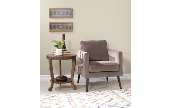 Contemporary Madison 22'' brown round side table with solid acacia wood, MDF, paper veneer, curved apron, tapered legs, and lower shelf for display.