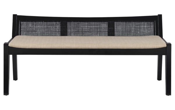 Bridget Black Rattan Cane Bench with beige polyester fabric cushion, natural rubberwood frame, and woven rattan backrest in contemporary style.