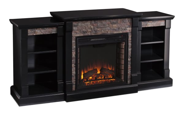 Norin 71.8'' black traditional electric fireplace and TV stand with MDF, poplar, glass, resin, and metal. Features LED flame effect, rustic stone accents, and dual open bookshelves for storage.