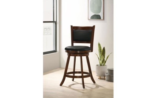 Romero Black & Brown Upholstered Counter Height Swivel Stool with black faux leather seat, brown laminated veneer lumber frame, angled legs, round footrest, and 360-degree swivel in transitional style.